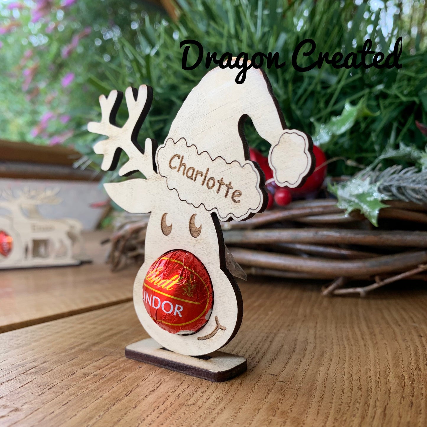 Personalised Reindeer Chocolate Holder: Wooden Christmas Table Decoration, Lindor Chocolate, Place Setting