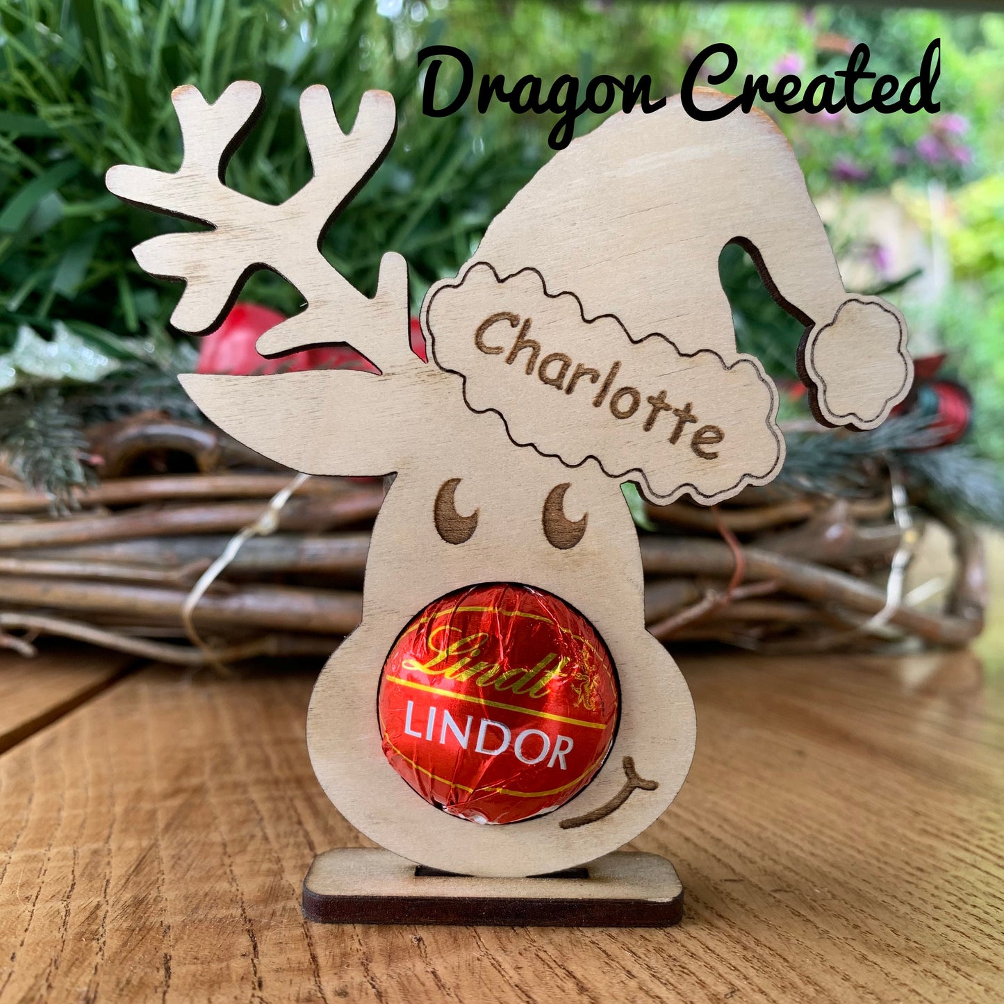 Personalised Reindeer Chocolate Holder: Wooden Christmas Table Decoration, Lindor Chocolate, Place Setting